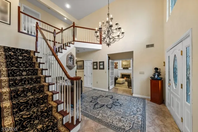 a bedroom with furniture and a fireplace