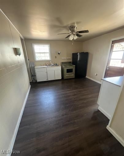 606 Ridge Avenue New Cumberland, WV 26047 - Photo 3 of 6 Kitchen featuring stove, refrigerator, and a ceiling fan