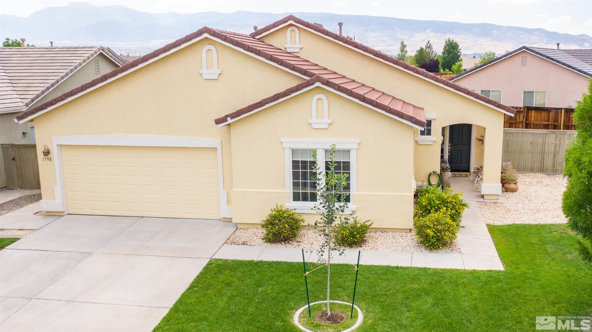 1798 Ornellaia Way Reno, NV 89521 - Photo 1 of 24 a view of a house with a yard