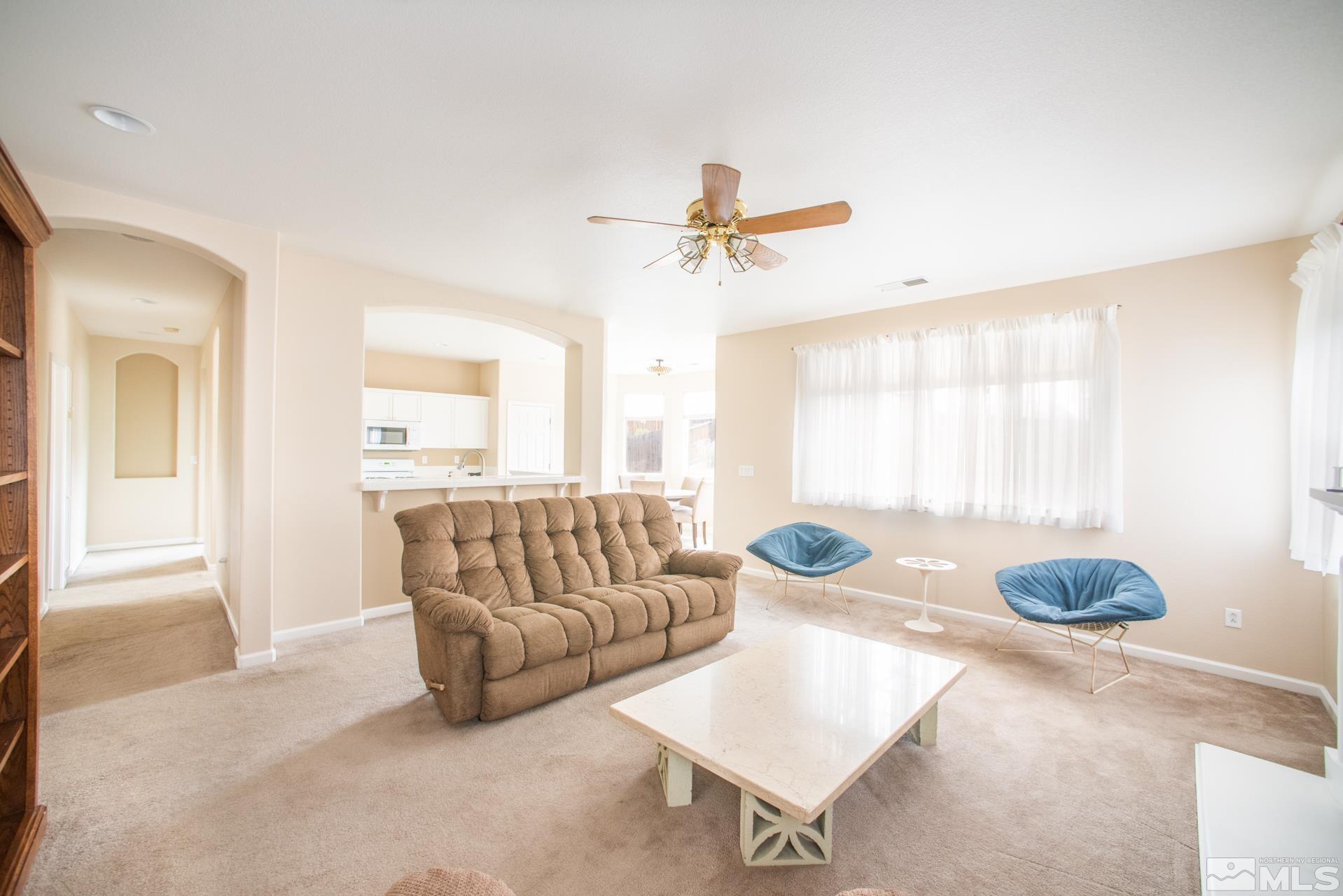 1798 Ornellaia Way Reno, NV 89521 - Photo 2 of 24 a living room with furniture and a window