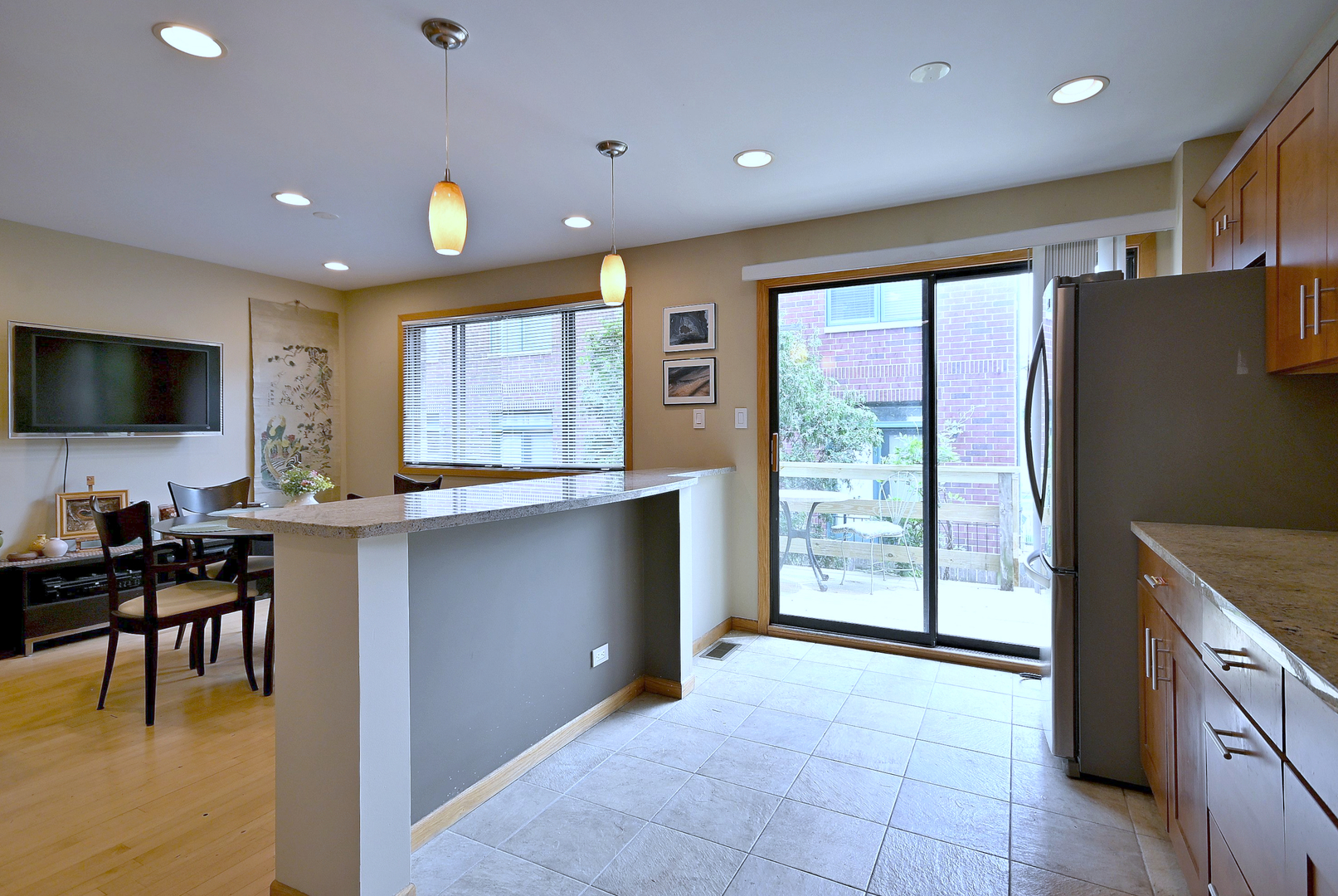 2350 North Sayre Avenue, Unit G Chicago, IL 60707 - Photo 11 of 30 a kitchen with stainless steel appliances granite countertop a refrigerator and a stove top oven