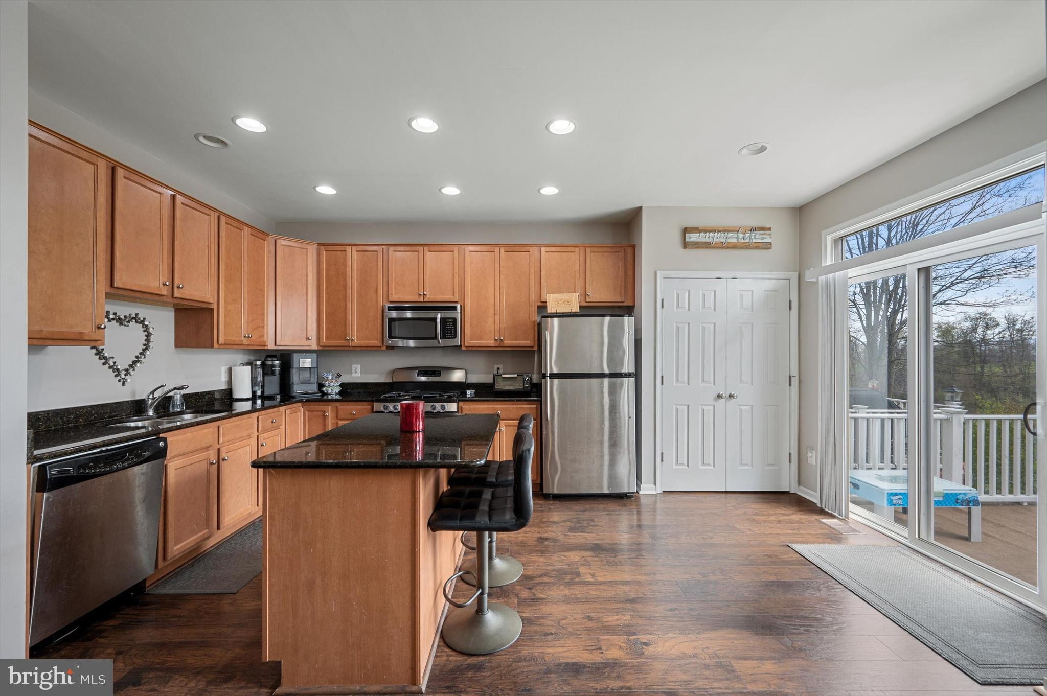 15 Driver Square Front Royal, VA 22630 - Photo 11 of 45 a kitchen with stainless steel appliances granite countertop a refrigerator stove microwave and sink