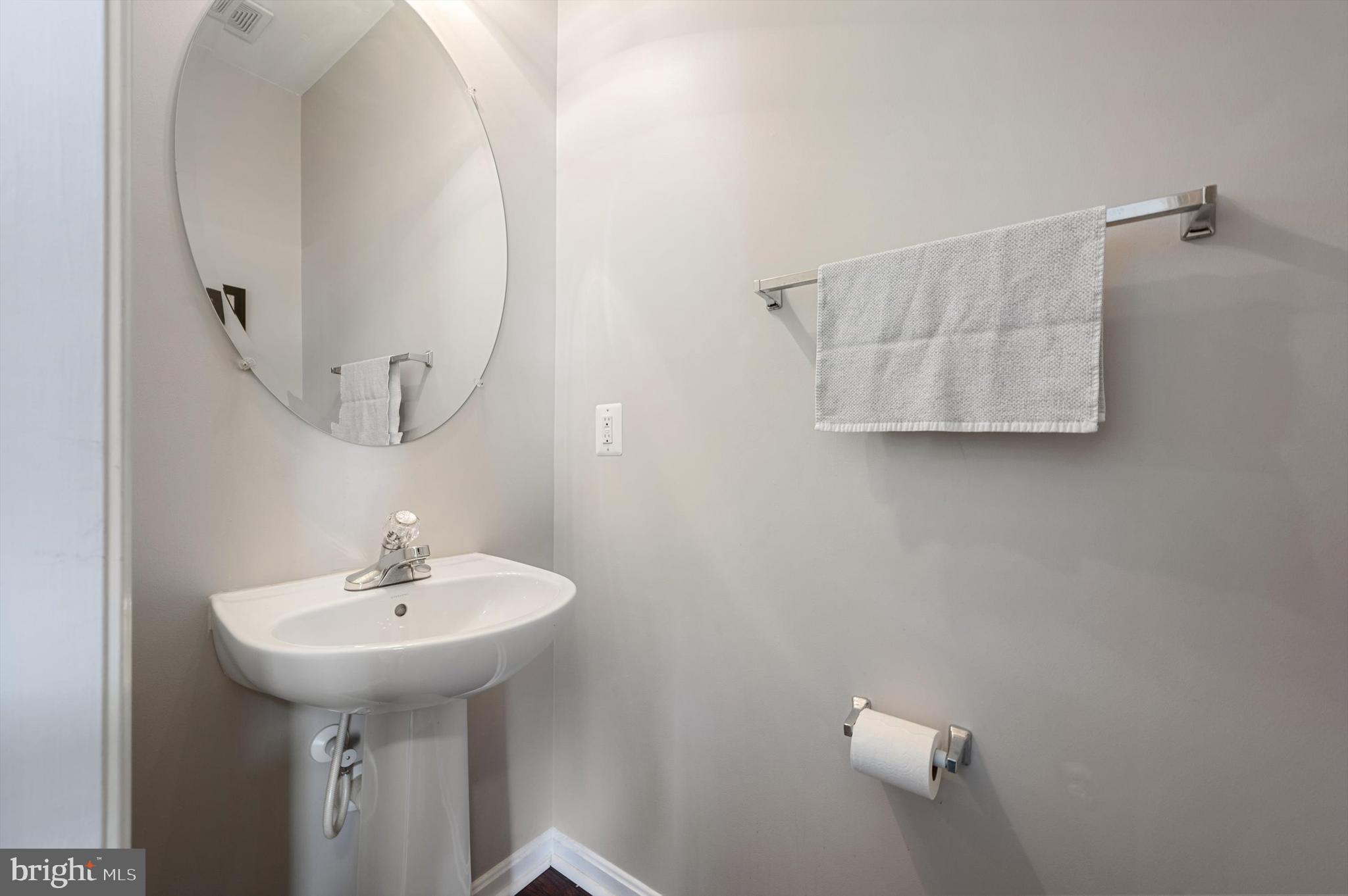 15 Driver Square Front Royal, VA 22630 - Photo 14 of 45 a bathroom with a sink and mirror