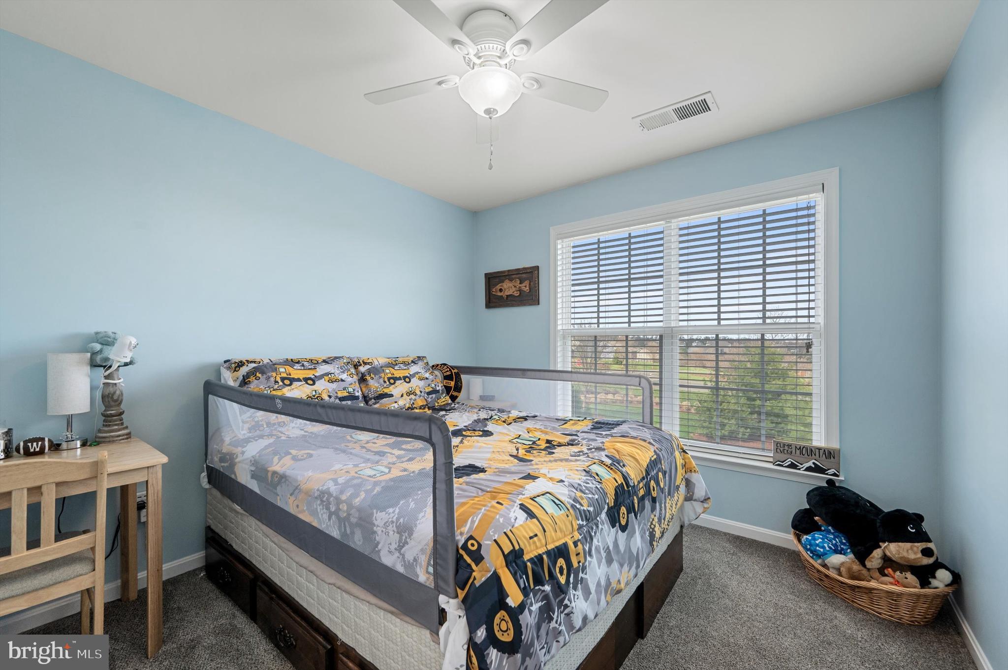 15 Driver Square Front Royal, VA 22630 - Photo 21 of 45 a bedroom with bed and a chandelier