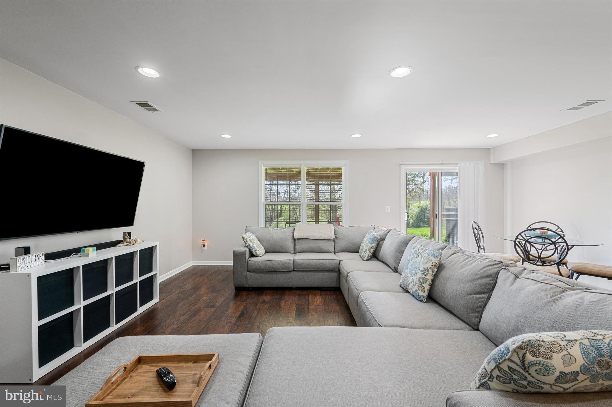 15 Driver Square Front Royal, VA 22630 - Photo 27 of 45 a living room with furniture and a flat screen tv