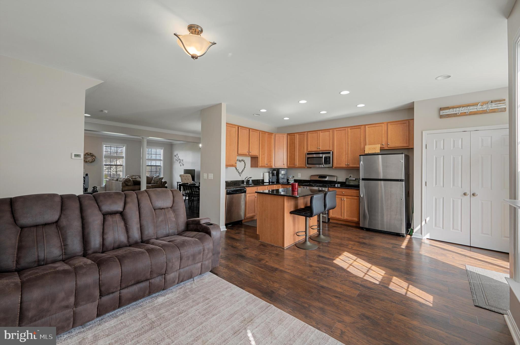15 Driver Square Front Royal, VA 22630 - Photo 9 of 45 a living room with furniture kitchen and a wooden floor