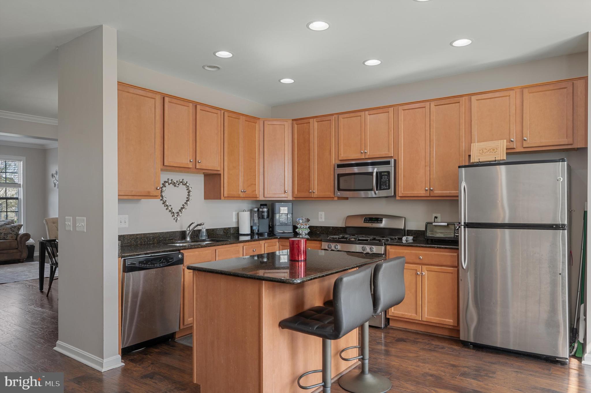15 Driver Square Front Royal, VA 22630 - Photo 10 of 45 a kitchen with granite countertop a refrigerator stove top oven and sink