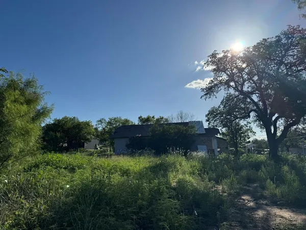 a view of a lake from a yard
