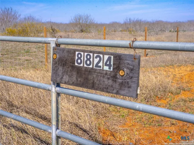 a view of a yard with an outdoor space