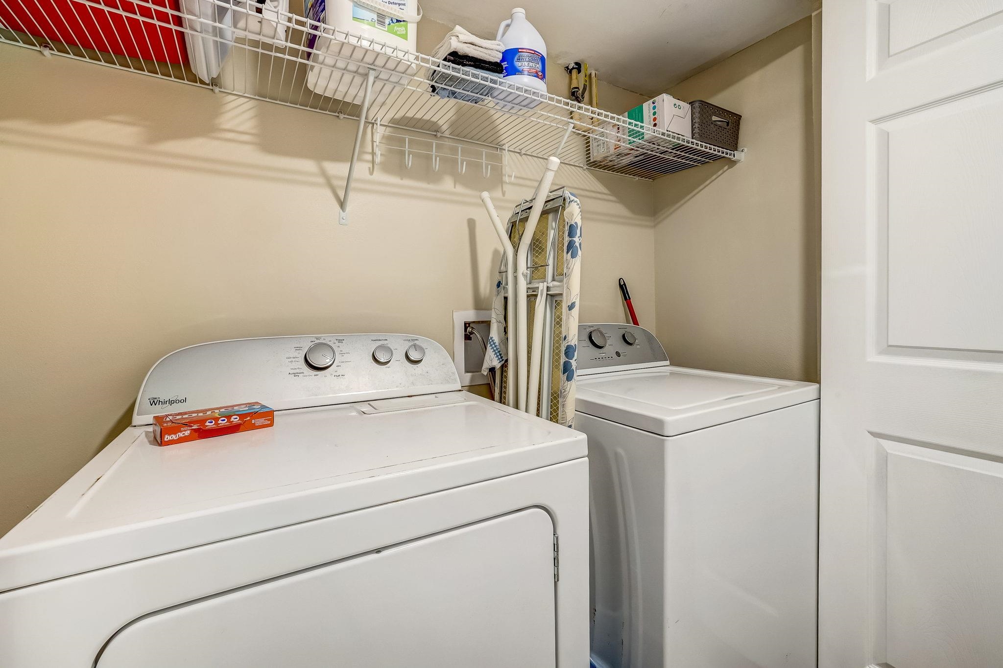 4 Ocean Trace Road, Unit 108 St. Augustine, FL 32080 - Photo 25 of 54 Laundry area with washer and dryer