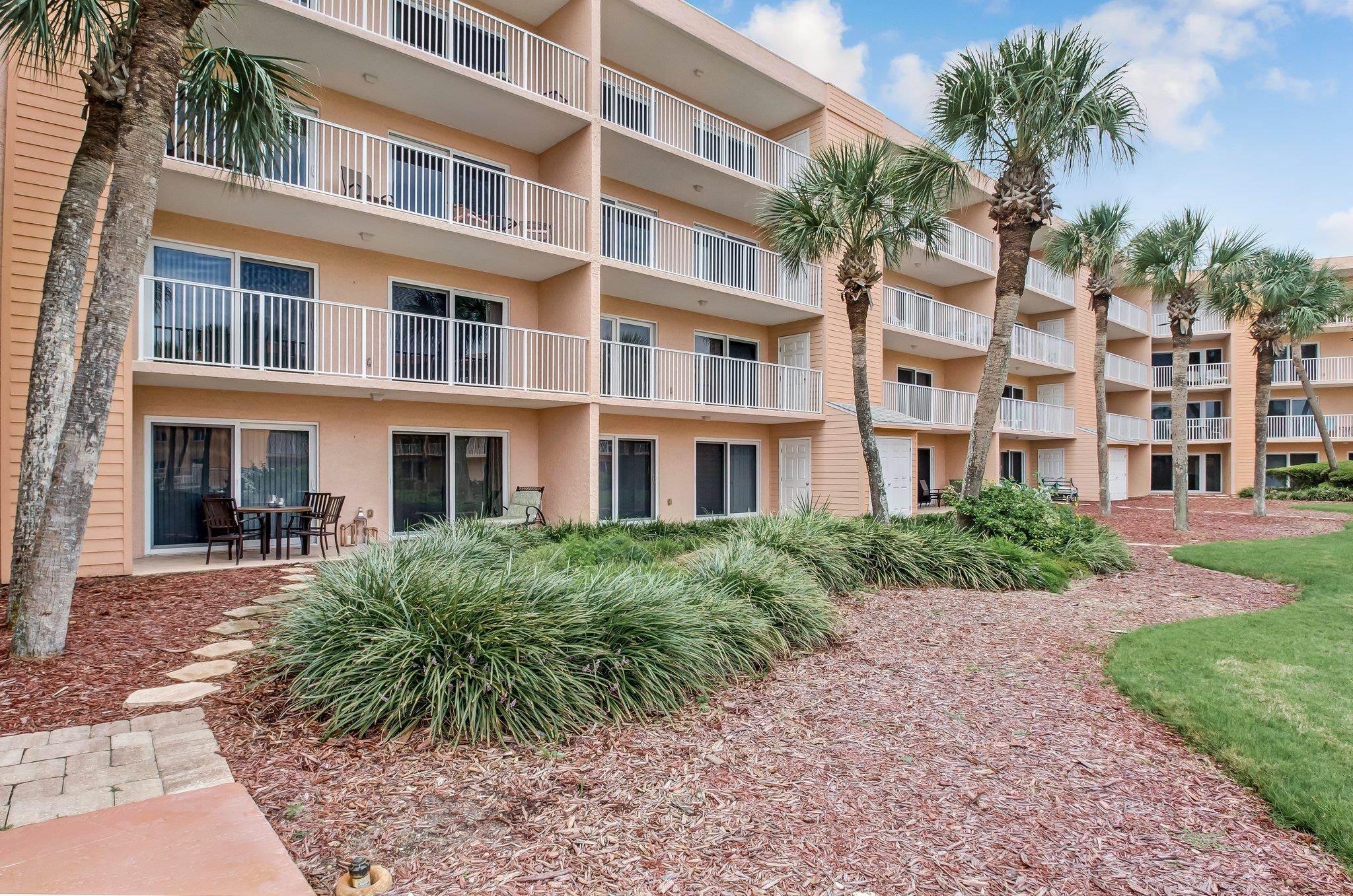 4 Ocean Trace Road, Unit 108 St. Augustine, FL 32080 - Photo 3 of 54 a front view of a building