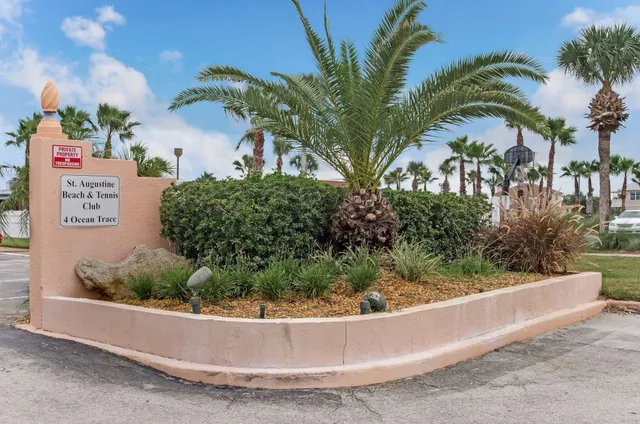 a view of building with yard