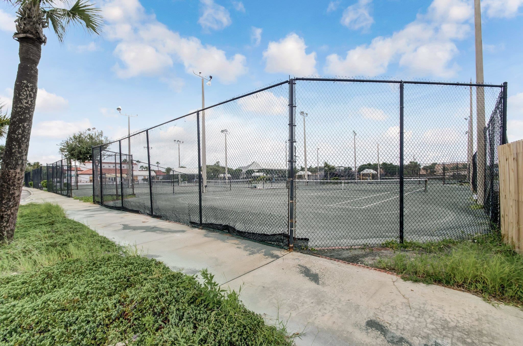 4 Ocean Trace Road, Unit 108 St. Augustine, FL 32080 - Photo 40 of 54 a view of a road from a backyard of a house