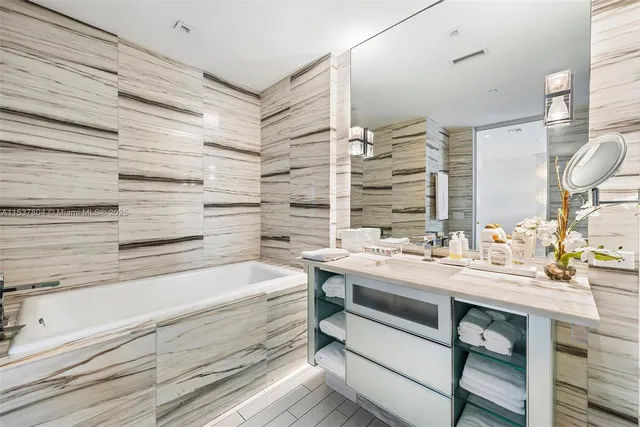 a bathroom with a sink and a bathtub