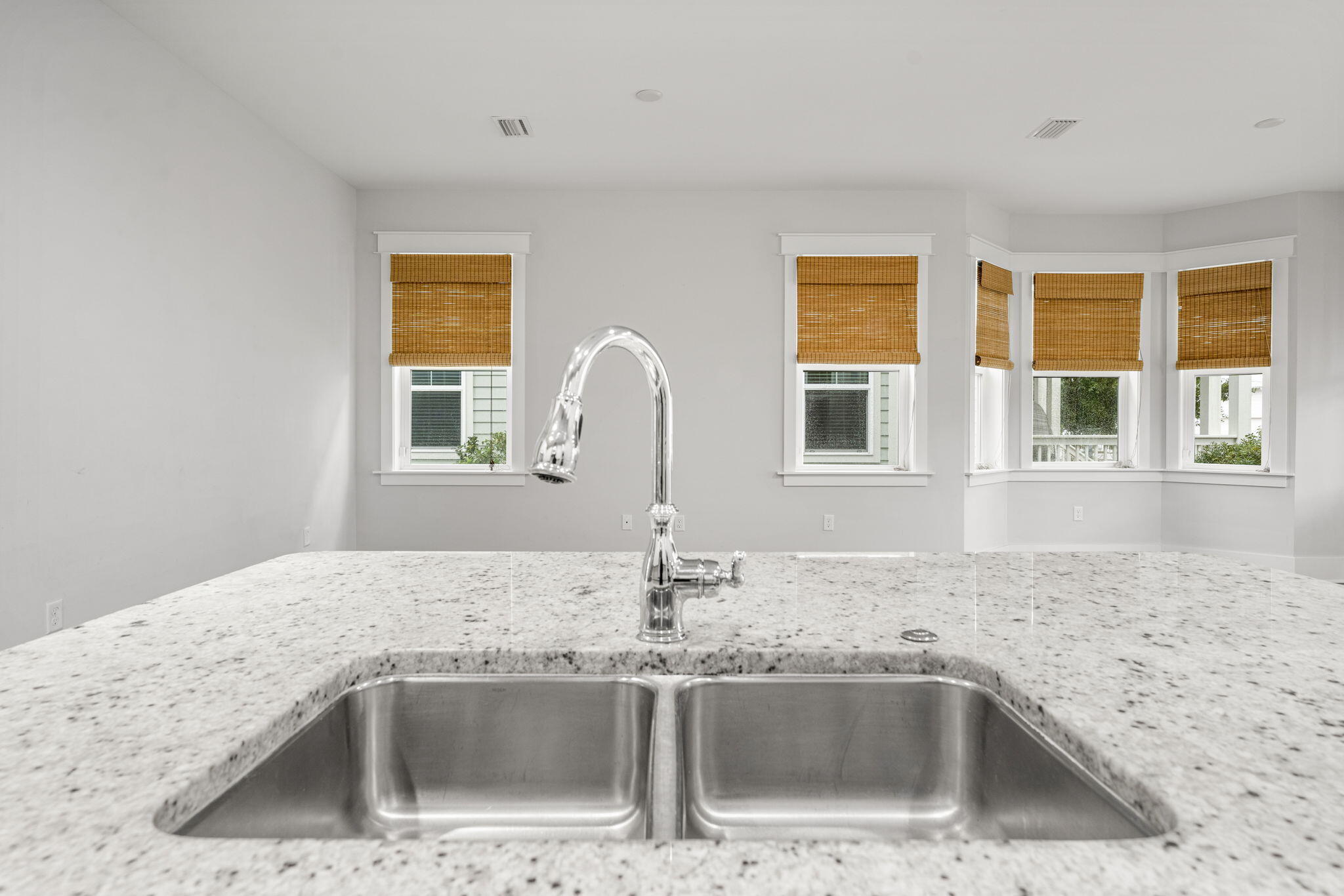 426 Flatwoods Forest Loop Santa Rosa Beach, FL 32459 - Photo 13 of 59 a kitchen with stainless steel appliances granite countertop a sink and a granite counter tops