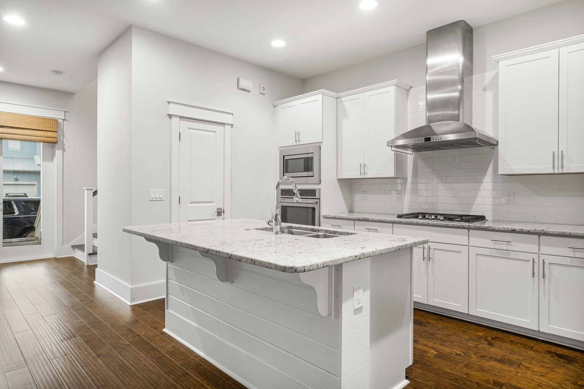 426 Flatwoods Forest Loop Santa Rosa Beach, FL 32459 - Photo 14 of 59 a kitchen with stainless steel appliances granite countertop a sink and cabinets