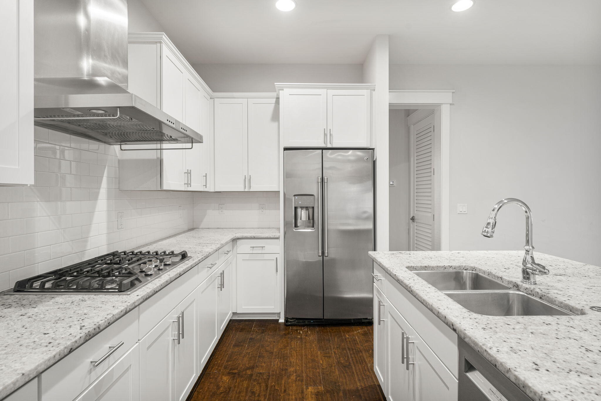 426 Flatwoods Forest Loop Santa Rosa Beach, FL 32459 - Photo 16 of 59 a kitchen with a sink stove and refrigerator