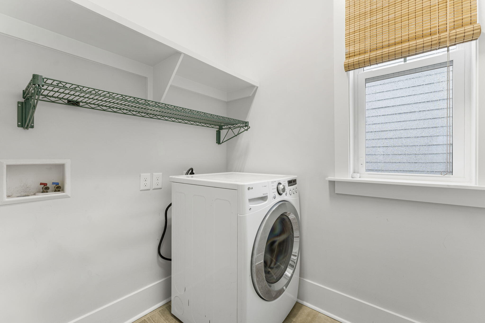 426 Flatwoods Forest Loop Santa Rosa Beach, FL 32459 - Photo 21 of 59 a utility room with dryer and washer
