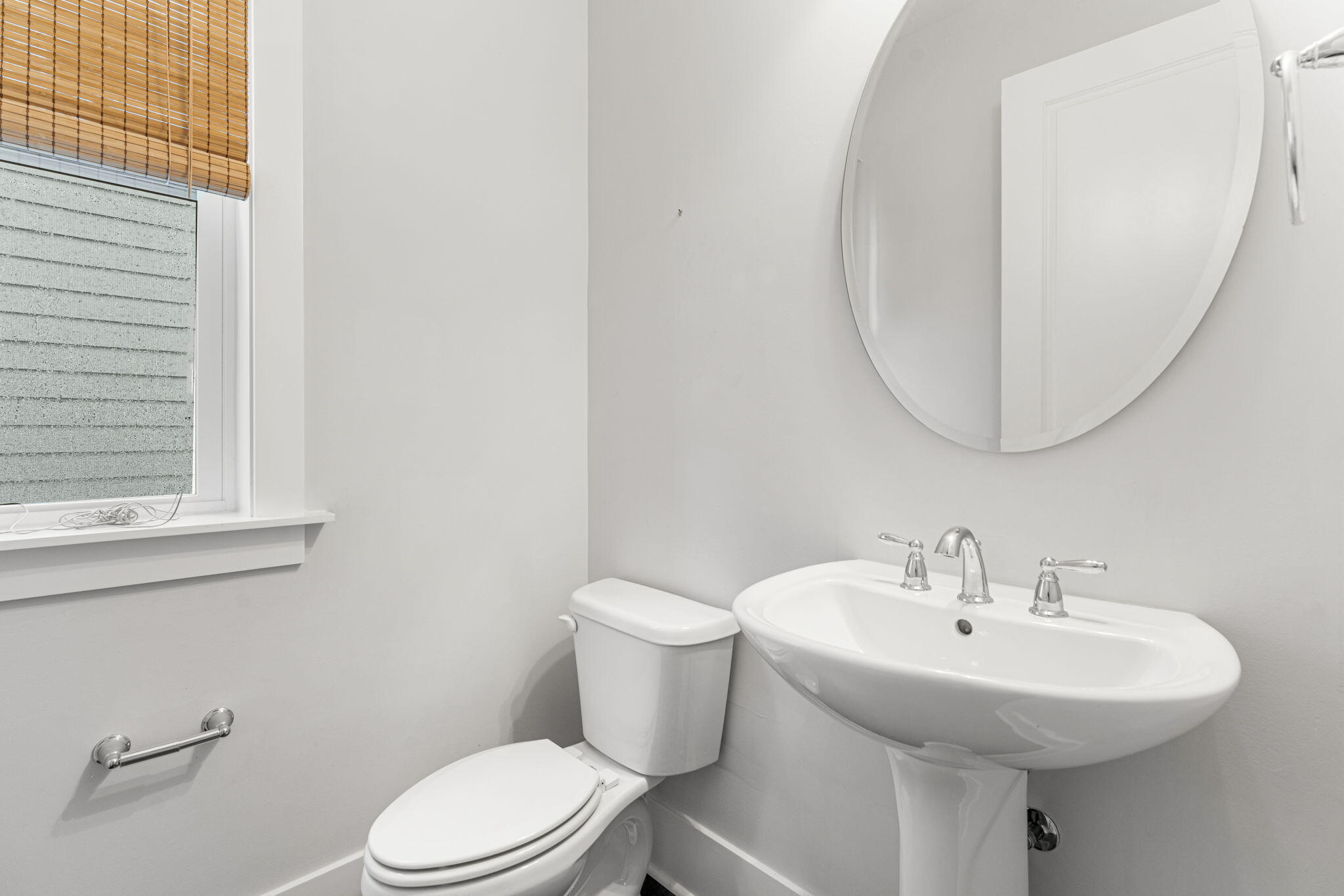 426 Flatwoods Forest Loop Santa Rosa Beach, FL 32459 - Photo 22 of 59 a bathroom with a sink a mirror and a toilet