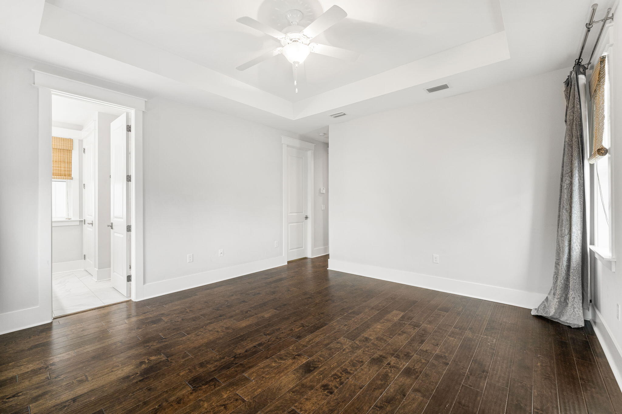 426 Flatwoods Forest Loop Santa Rosa Beach, FL 32459 - Photo 33 of 59 an empty room with wooden floor and a window