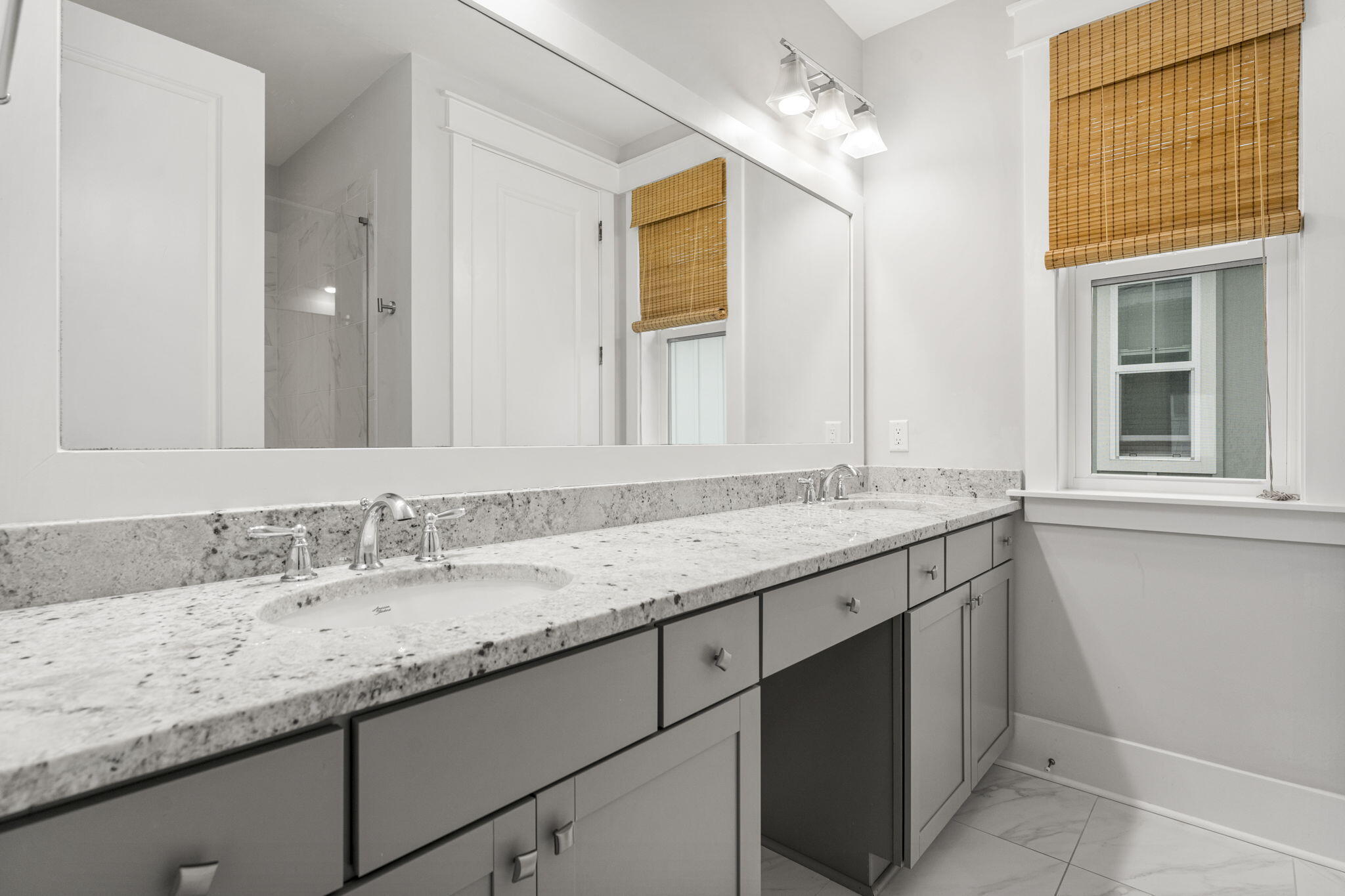 426 Flatwoods Forest Loop Santa Rosa Beach, FL 32459 - Photo 34 of 59 a bathroom with a granite countertop sink and a mirror