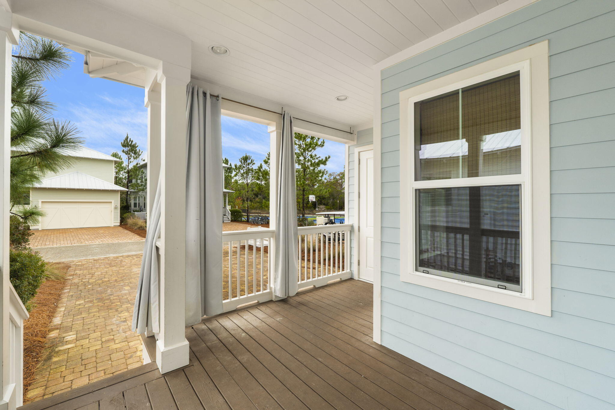 426 Flatwoods Forest Loop Santa Rosa Beach, FL 32459 - Photo 39 of 59 a view of front door of house with wooden floor