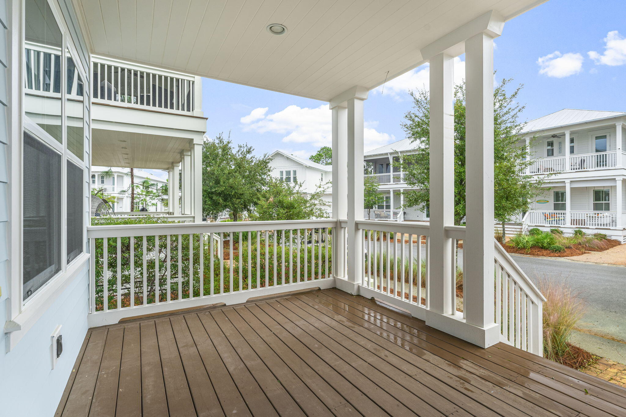 426 Flatwoods Forest Loop Santa Rosa Beach, FL 32459 - Photo 5 of 59 a view of a balcony with wooden floor
