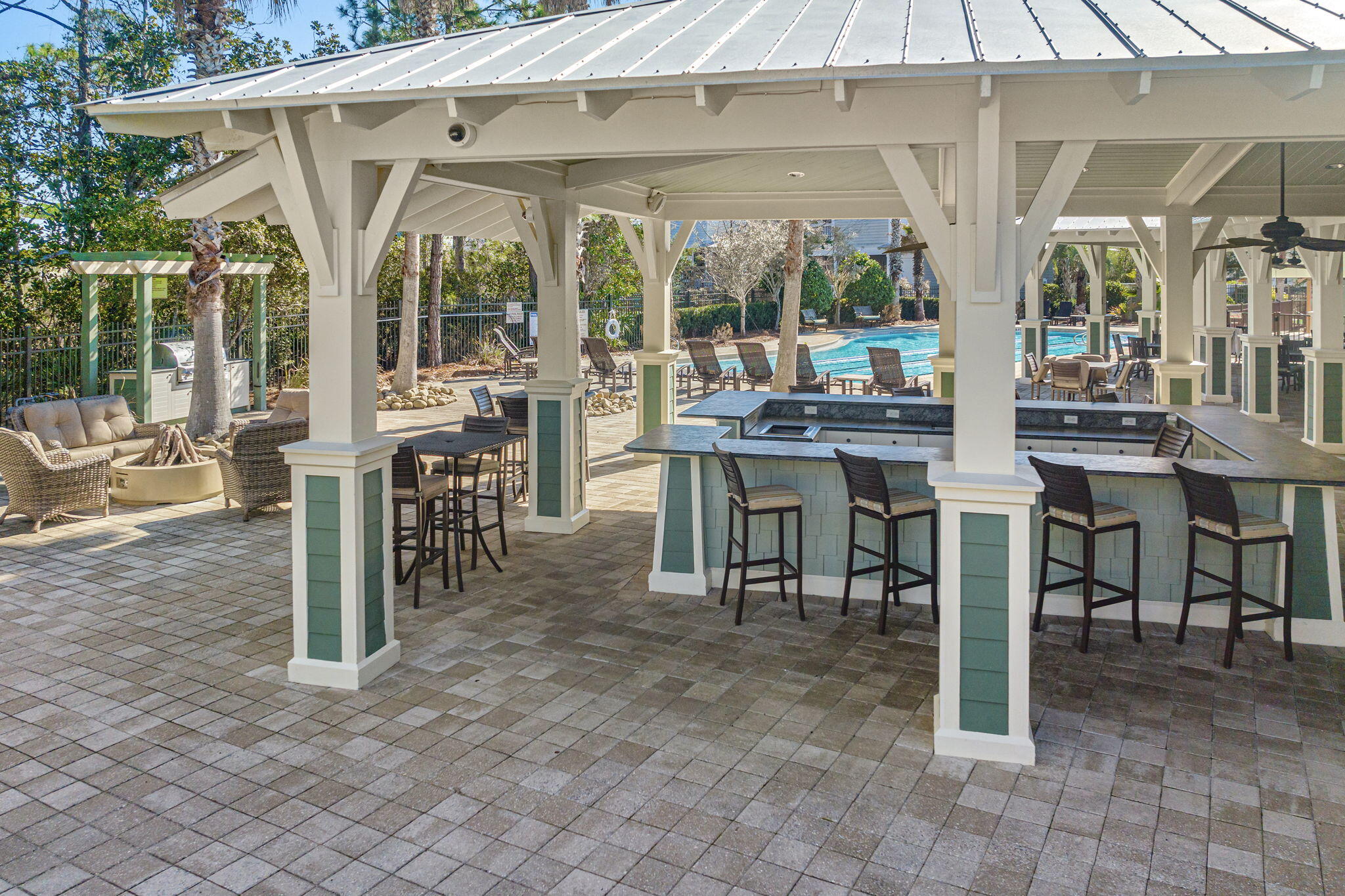 426 Flatwoods Forest Loop Santa Rosa Beach, FL 32459 - Photo 54 of 59 a view of a patio with table and chairs