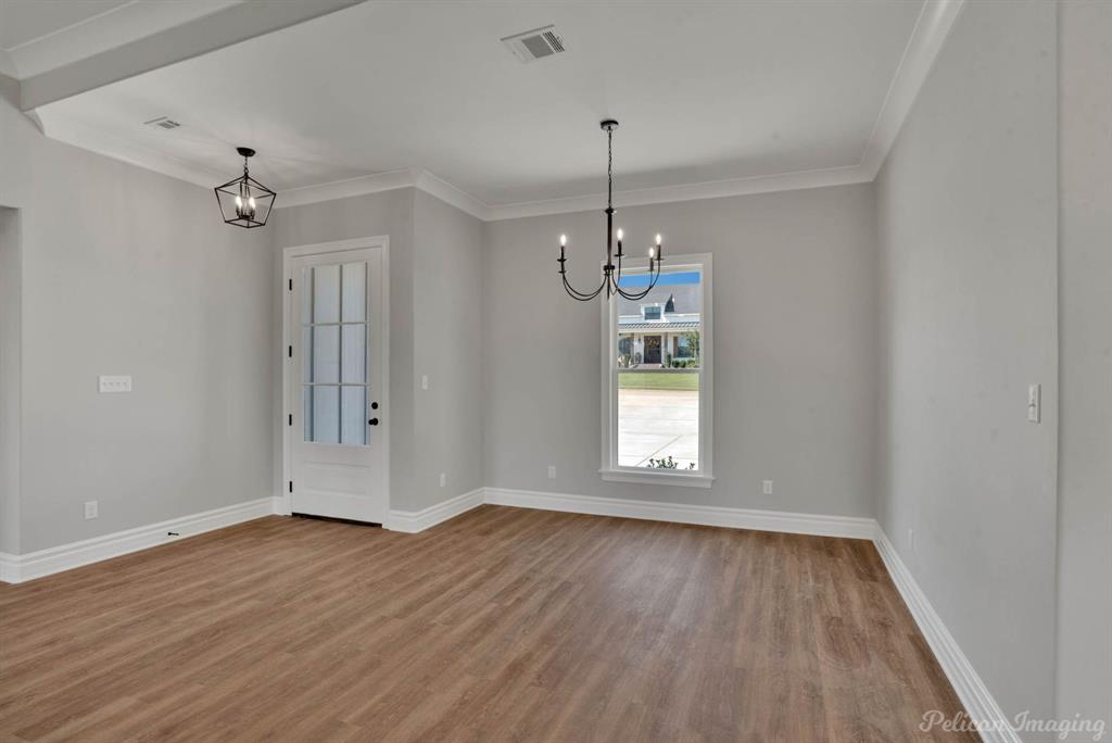 165 Oak Aly Road Stonewall, LA 71078 - Photo 13 of 36 wooden floor in an empty room with a window
