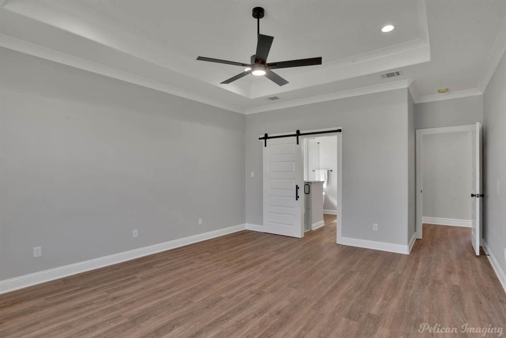 165 Oak Aly Road Stonewall, LA 71078 - Photo 21 of 36 a view of empty room with wooden floor