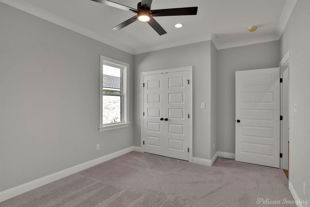 165 Oak Aly Road Stonewall, LA 71078 - Photo 27 of 36 an empty room with windows and closet