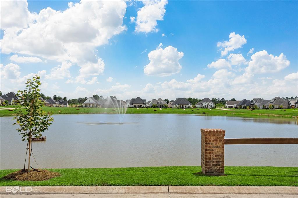 165 Oak Aly Road Stonewall, LA 71078 - Photo 36 of 36 a view of a lake with a big yard