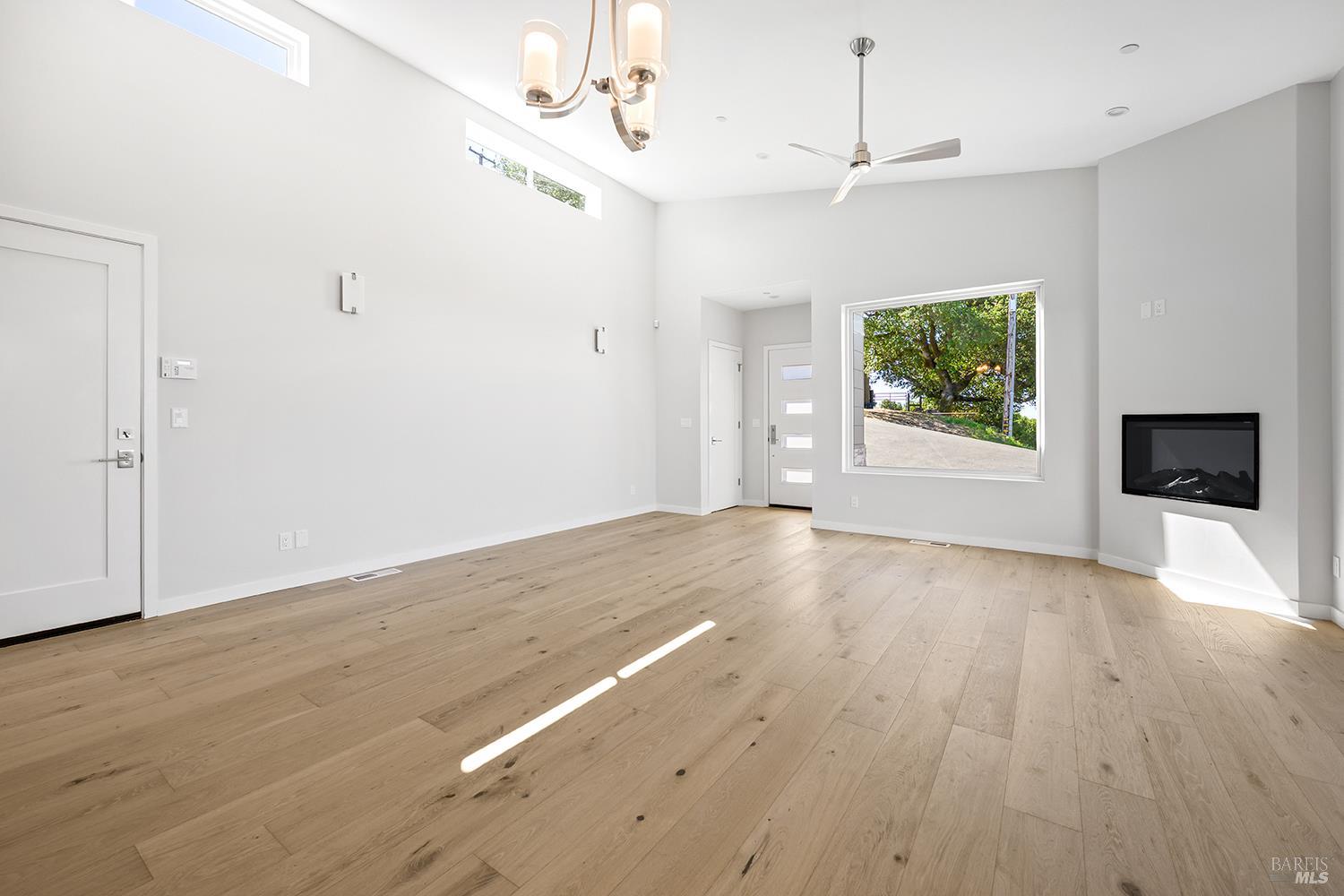 1292 Wikiup Drive Santa Rosa, CA 95403 - Photo 13 of 32 wooden floor in an empty room with a window