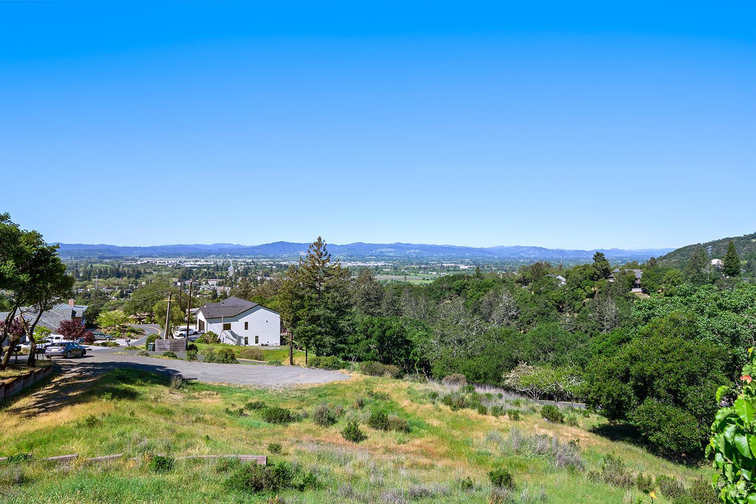 1292 Wikiup Drive Santa Rosa, CA 95403 - Photo 15 of 32 a view of a town with mountains in the background