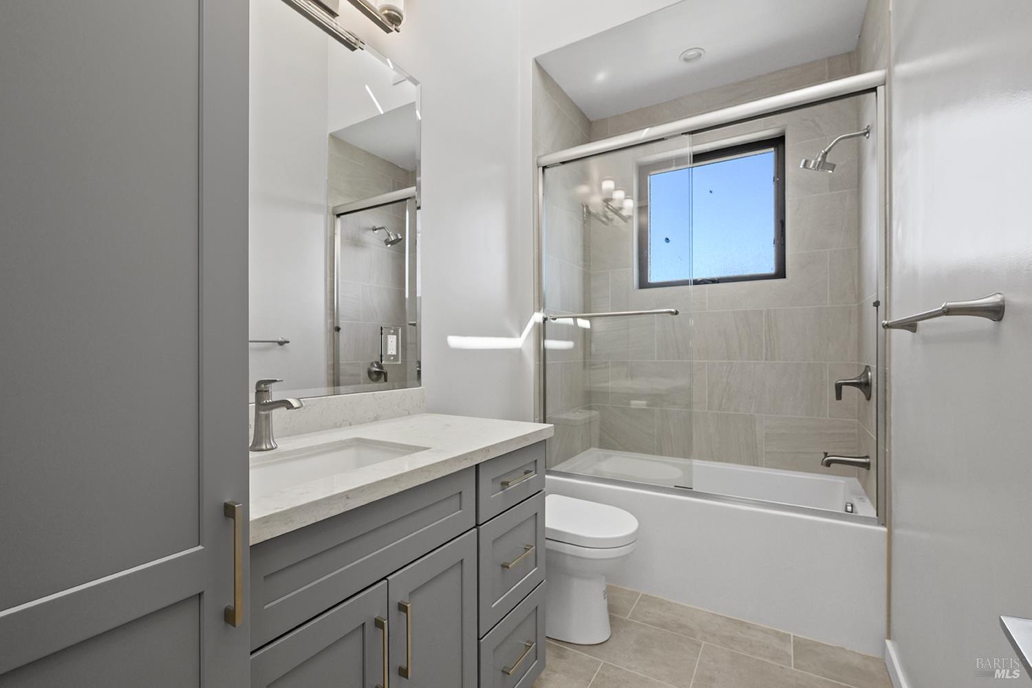 1292 Wikiup Drive Santa Rosa, CA 95403 - Photo 18 of 32 a bathroom with a sink a toilet and shower