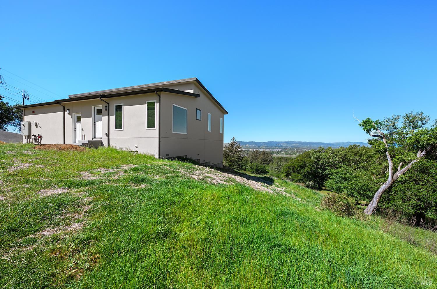 1292 Wikiup Drive Santa Rosa, CA 95403 - Photo 27 of 32 a view of a house with a yard