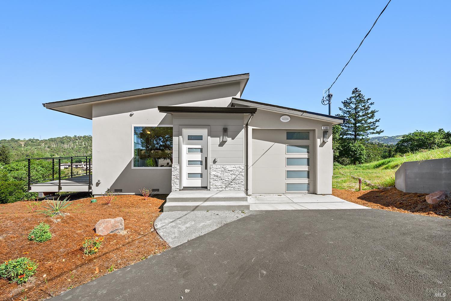 1292 Wikiup Drive Santa Rosa, CA 95403 - Photo 31 of 32 a view of a house with porch and a yard