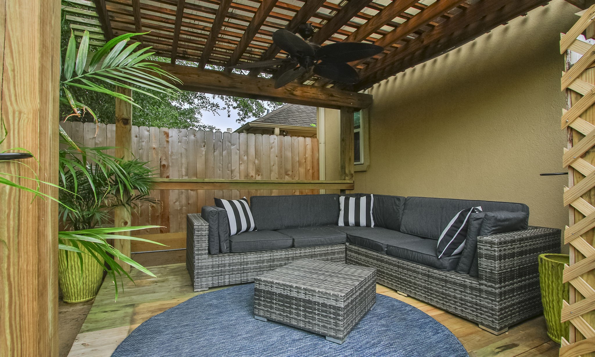 16610 Manningtree Lane Spring, TX 77379 - Photo 48 of 50 The pergola includes a ceiling fan and beautiful lighting in the evening is a very relaxing space that also includes a hook up for a hot tub.