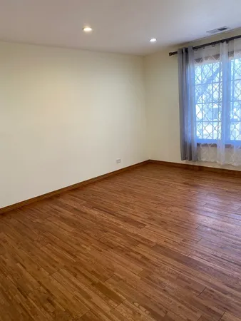 a bathroom with a sink vanity granite toilet and shower