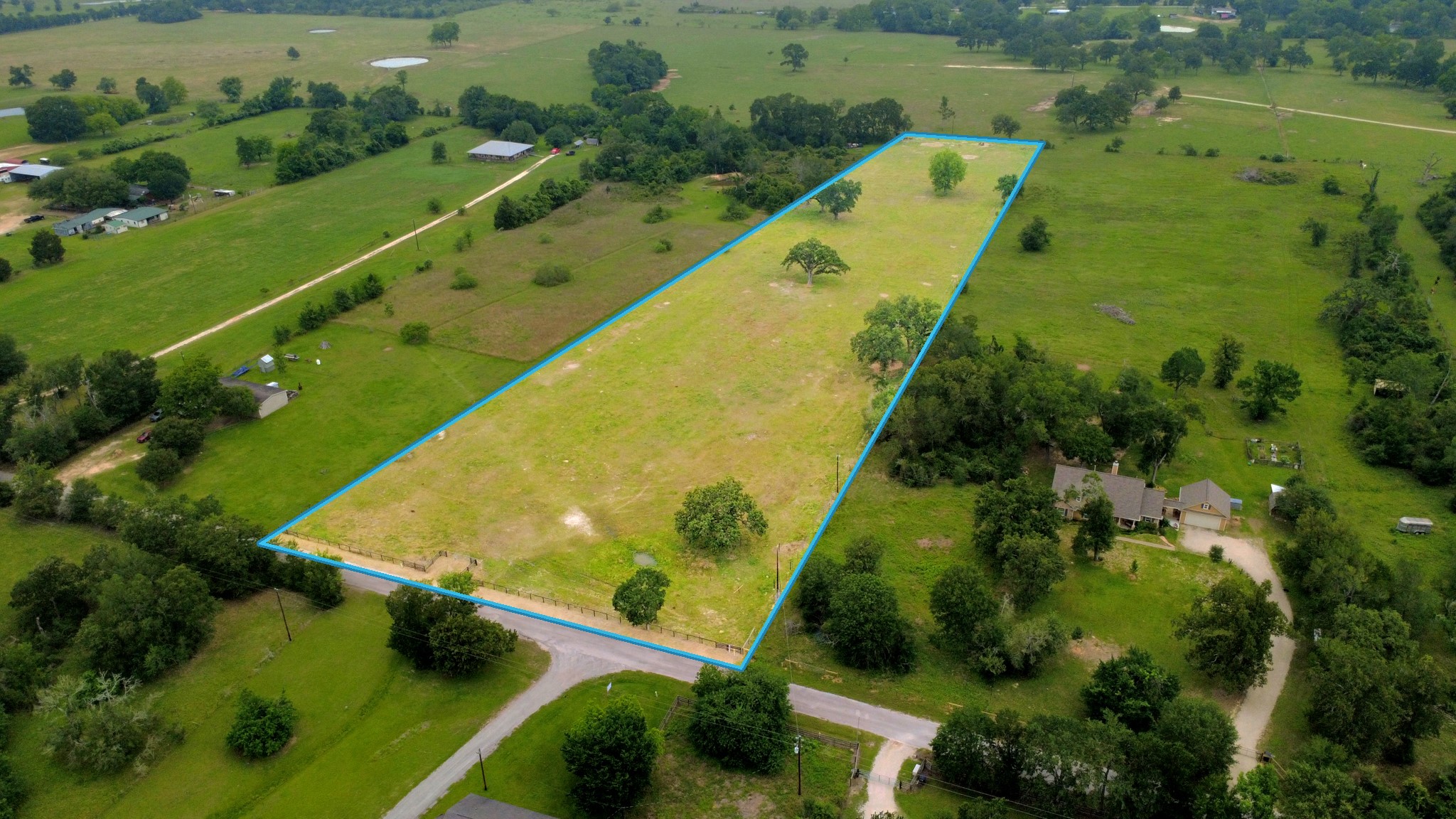 47130 Qualls Road Hempstead, TX 77445 - Photo 3 of 10 an aerial view of a residential houses with outdoor space and swimming pool