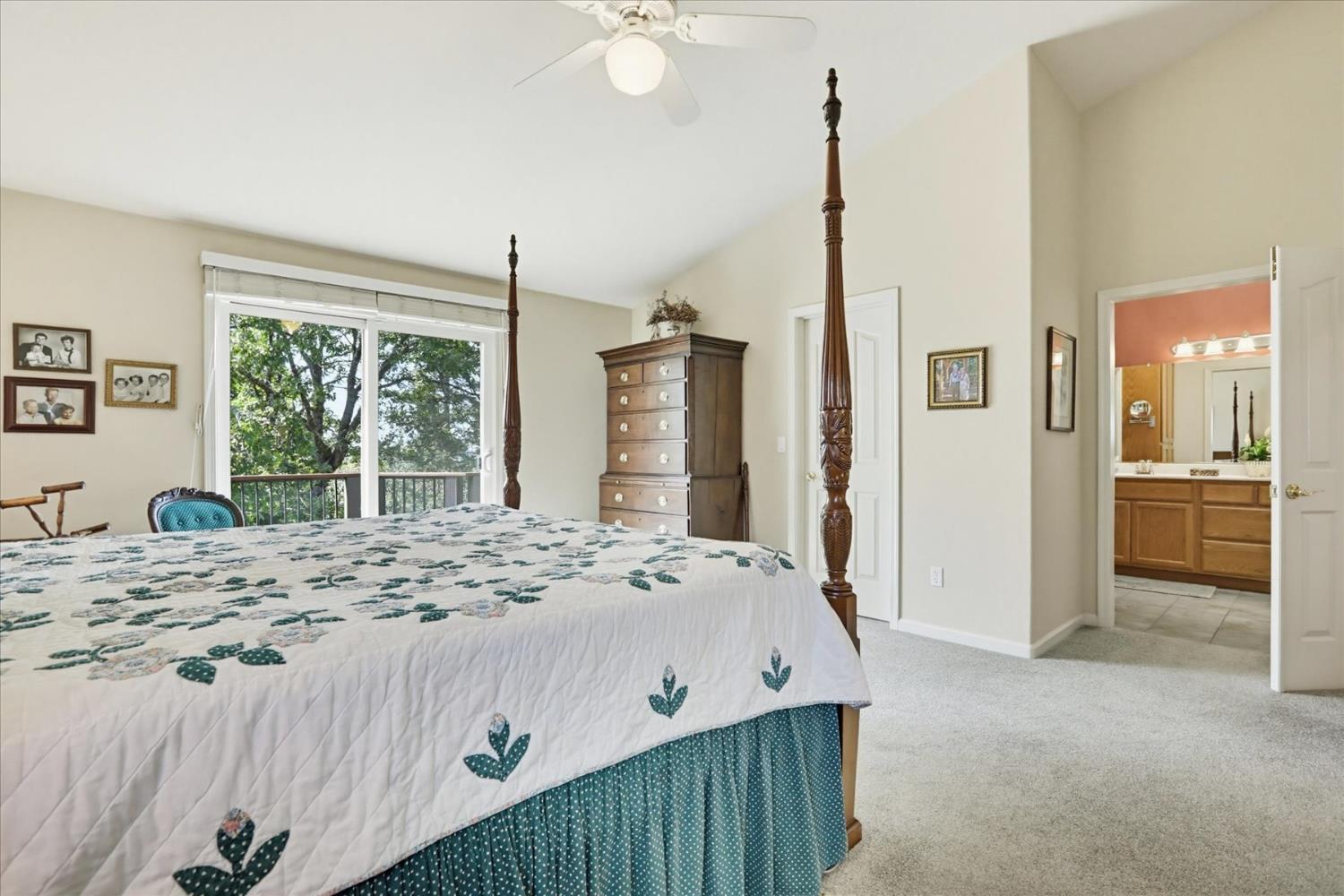 970 Morgan Ranch Drive Grass Valley, CA 95945 - Photo 22 of 76 a bedroom with a bed and a large window