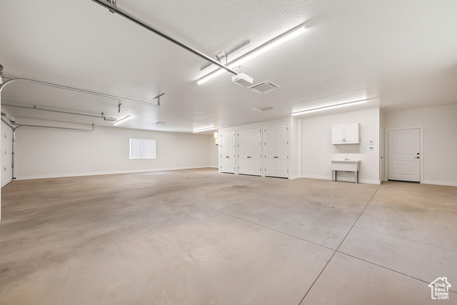 230 Boulder Way Leeds, UT 84746 - Photo 42 of 72 Air-cooled garage with baseboards, widows with vertical blinds, cabinetry for water heaters, A/C and attached air-cooled pantry storage room.