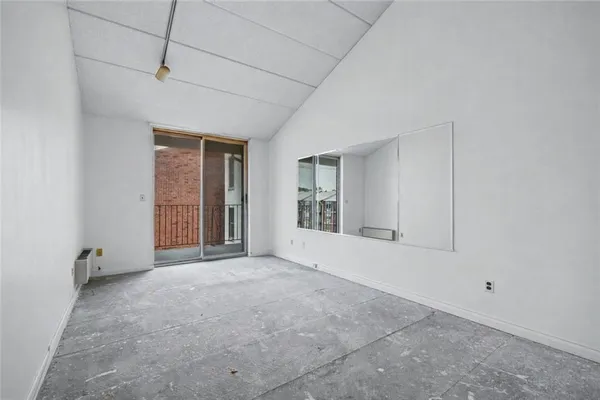 an empty room with windows