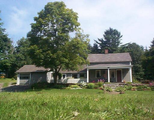 45 Kent Road Warren, CT 06754 - Photo 1 of 1 a front view of a house with a garden