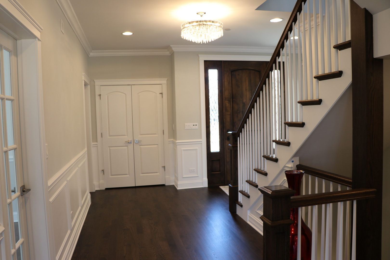 2247 Illinois Road Northbrook, IL 60062 - Photo 11 of 32 a view of hallway with stairs and wooden floor