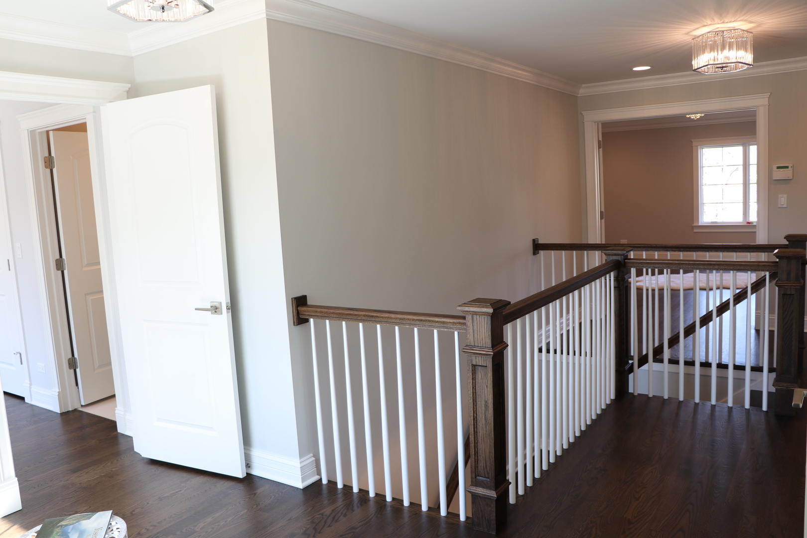 2247 Illinois Road Northbrook, IL 60062 - Photo 12 of 32 a view of a hallway with wooden floor and windows