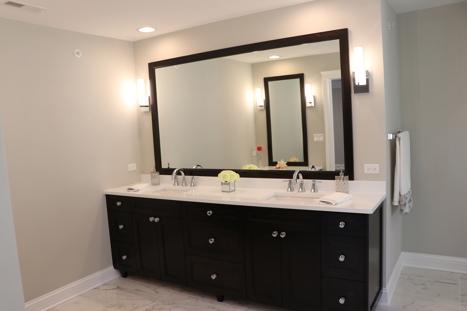 2247 Illinois Road Northbrook, IL 60062 - Photo 15 of 32 a bathroom with a double vanity sink and mirror