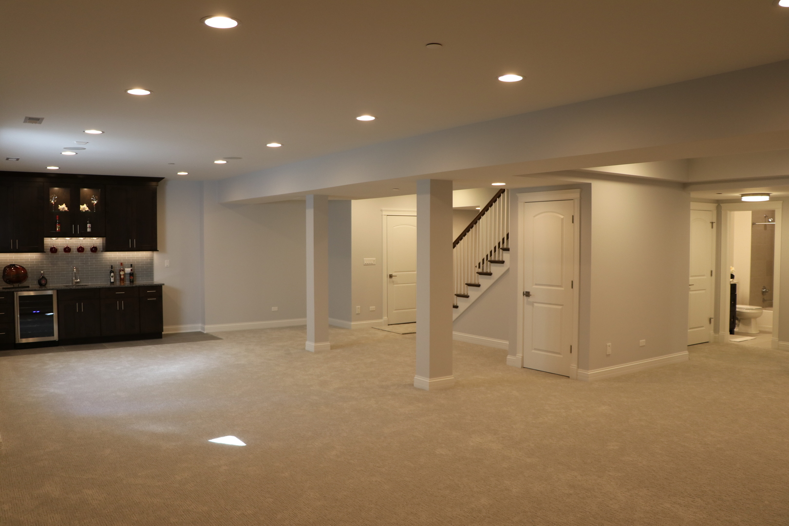 2247 Illinois Road Northbrook, IL 60062 - Photo 23 of 32 a view of an empty room with wooden floor and windows