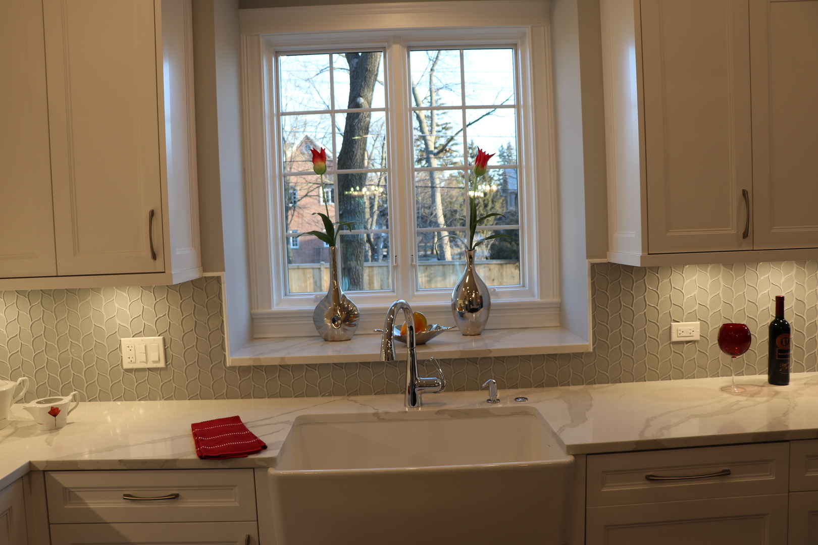 2247 Illinois Road Northbrook, IL 60062 - Photo 7 of 32 a kitchen with a sink cabinets and a window
