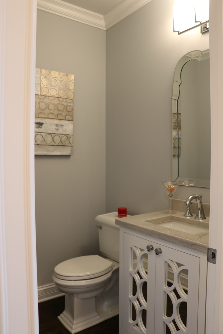 2247 Illinois Road Northbrook, IL 60062 - Photo 8 of 32 a bathroom with a sink toilet and shower